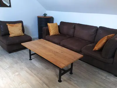 Coin salon dans l'établissement Au 112, maison d'hôtes meublée