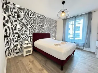Un ou plusieurs lits dans un hébergement de l'établissement Forum Graphic magnifique T2 spacieux au centre