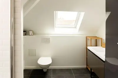 Salle de bains dans l'établissement Le Rémois proche du centre-ville