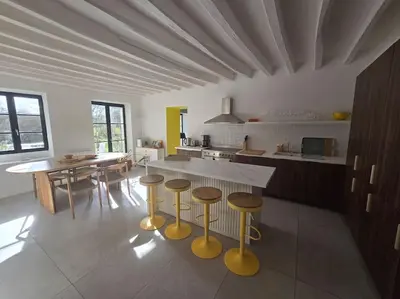 Coin salon dans l'établissement Grand Ferme entièrement rénovée - 1h de Paris 8pax