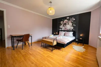 Un ou plusieurs lits dans un hébergement de l'établissement Évasion à Oiry Villa Madeline