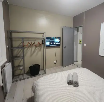 Un ou plusieurs lits dans un hébergement de l'établissement Bel Appartement Centre-Ville