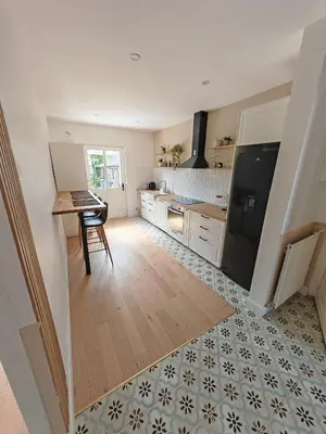 Cuisine ou kitchenette dans l'établissement Appartement Cosy et accueillant