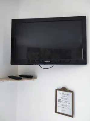 Télévision ou salle de divertissement dans l'établissement Chez Elise & JD