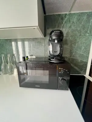 Cuisine ou kitchenette dans l'établissement Cozy Stay with Terrace - 20 min Disneyland Paris