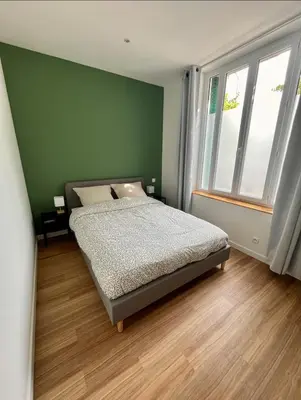 Un ou plusieurs lits dans un hébergement de l'établissement Cozy Stay with Terrace - 20 min Disneyland Paris