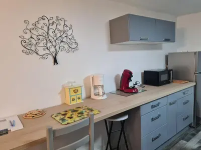 Cuisine ou kitchenette dans l'établissement Gite chez carole