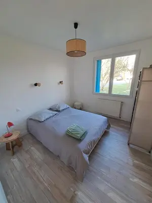 Un ou plusieurs lits dans un hébergement de l'établissement Paris-Reims, 10 personnes, 4 chambres- Spa, Grand jardin privé
