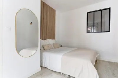Un ou plusieurs lits dans un hébergement de l'établissement Le Bubbly - Appartement lumineux de 50m²