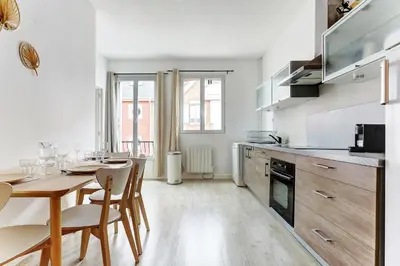 Cuisine ou kitchenette dans l'établissement Le Bubbly - Appartement lumineux de 50m²