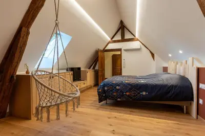 Un ou plusieurs lits dans un hébergement de l'établissement Le Château de Manon