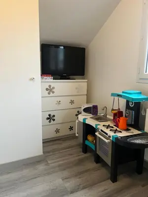 Télévision ou salle de divertissement dans l'établissement Maison pour 4 à 8 personnes à 15 min de Disney