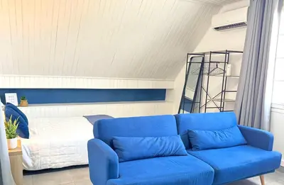 Coin salon dans l'établissement Appartement Platanes 6 - Proche Disney - Parking Gratuit - Meaux