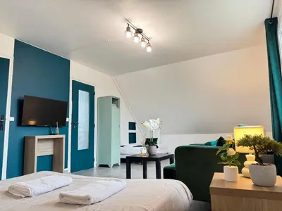 Un ou plusieurs lits dans un hébergement de l'établissement Appartement Platanes 7 - Proche Disneyland - Parking Gratuit - Meaux
