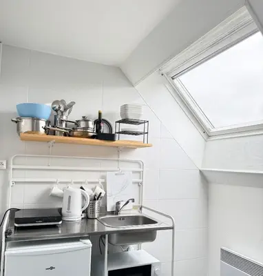 Cuisine ou kitchenette dans l'établissement Appartement Platanes 7 - Proche Disneyland - Parking Gratuit - Meaux