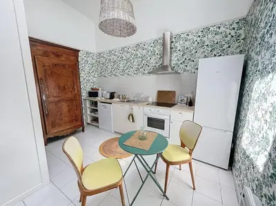 Cuisine ou kitchenette dans l'établissement Le Antoinette