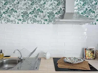 Cuisine ou kitchenette dans l'établissement Le Antoinette