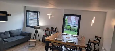 Coin salon dans l'établissement La maison d'à côté Chambre 2