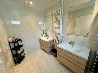 Salle de bains dans l'établissement Au Coeur du Quartier Taittinger