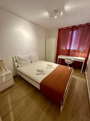 Un ou plusieurs lits dans un hébergement de l'établissement Au Coeur du Quartier Taittinger