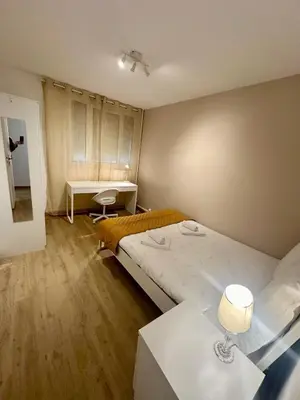 Un ou plusieurs lits dans un hébergement de l'établissement Au Coeur du Quartier Taittinger