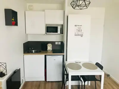Cuisine ou kitchenette dans l'établissement Studio 306 - Gare - Arena - centre Reims