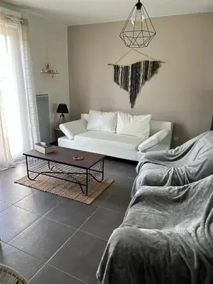 Coin salon dans l'établissement Maison à la campagne