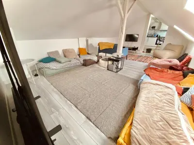 Un ou plusieurs lits dans un hébergement de l'établissement Belle appartement 4 chambres