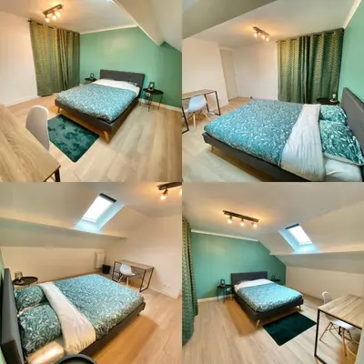 Un ou plusieurs lits dans un hébergement de l'établissement Belle appartement 4 chambres