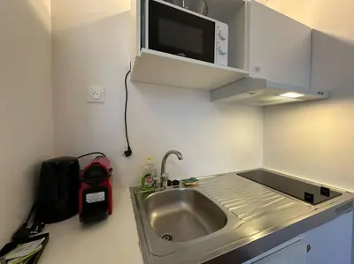 Cuisine ou kitchenette dans l'établissement Historique - Studio proche Cathédrale