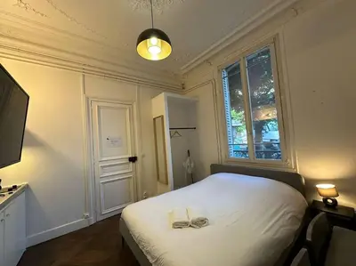 Un ou plusieurs lits dans un hébergement de l'établissement Historique - Studio proche Cathédrale