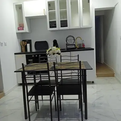 Cuisine ou kitchenette dans l'établissement La Maison du Cerisier