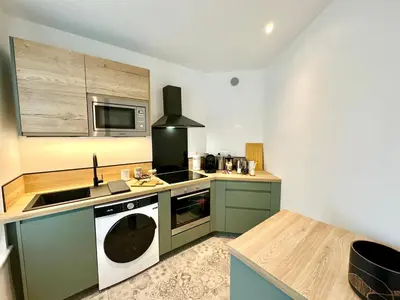 Cuisine ou kitchenette dans l'établissement Au Mélo' - Proche Gare & Centre