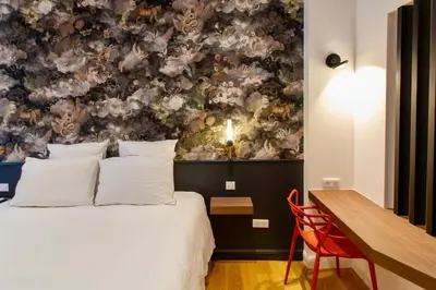Un ou plusieurs lits dans un hébergement de l'établissement La Rêverie - Deluxe Apartment - SPA - Place du Forum