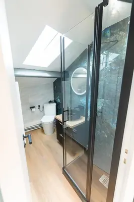 Salle de bains dans l'établissement Nid douillet sous les combles
