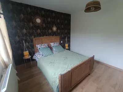 Un ou plusieurs lits dans un hébergement de l'établissement Le chalet du lilas