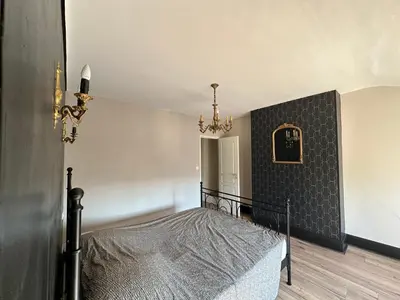 Un ou plusieurs lits dans un hébergement de l'établissement Gîte OPLM 8 p Proximité Charleville