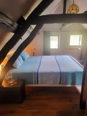 Un ou plusieurs lits dans un hébergement de l'établissement Charmante gite in idyllisch dorpje in Beau Village