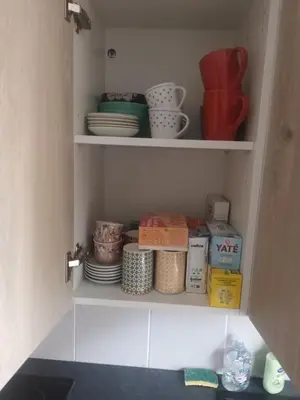 Cuisine ou kitchenette dans l'établissement Le cottage de Jeanne