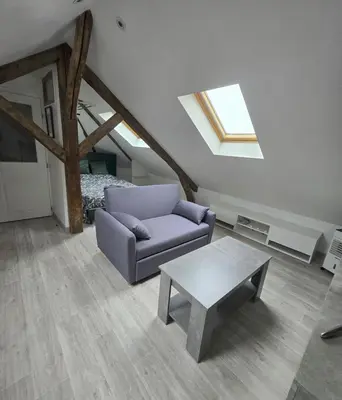 Coin salon dans l'établissement Studio cosy proche centre-ville