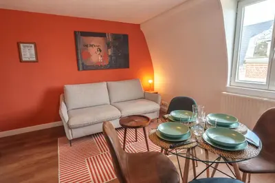 Coin salon dans l'établissement Appartement Tout Confort à Deux Pas de la Gare