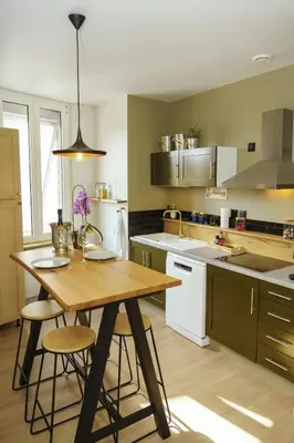 Cuisine ou kitchenette dans l'établissement Au P'tit Bouchon - free parking - duplex
