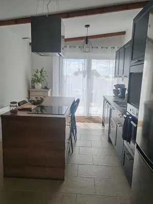 Cuisine ou kitchenette dans l'établissement Chez Peggy