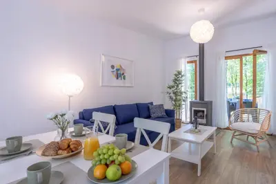 Coin salon dans l'établissement Les Charmes C10 - Le Val Joly