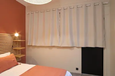 Un ou plusieurs lits dans un hébergement de l'établissement Superbe appartement proche cathédrale