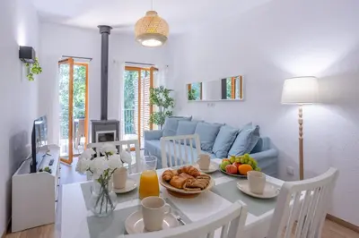 Coin salon dans l'établissement Les Charmes C23A - Le Val Joly