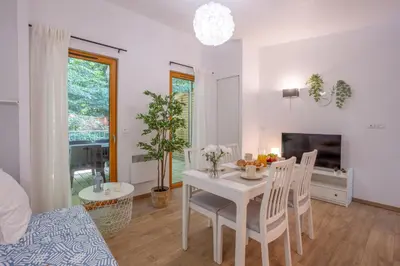 Coin salon dans l'établissement Les Charmes C40B - Le Val Joly