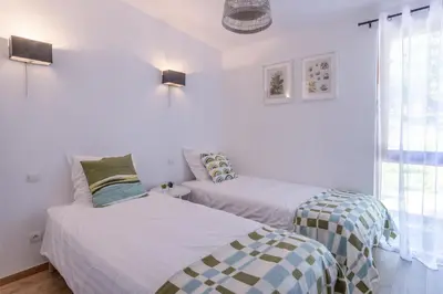 Un ou plusieurs lits dans un hébergement de l'établissement Les Charmes C38 - Le Val Joly