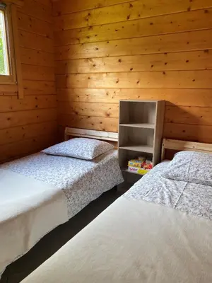 Un ou plusieurs lits dans un hébergement de l'établissement Chalet