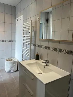 Salle de bains dans l'établissement Au Coin Champenois Epernay